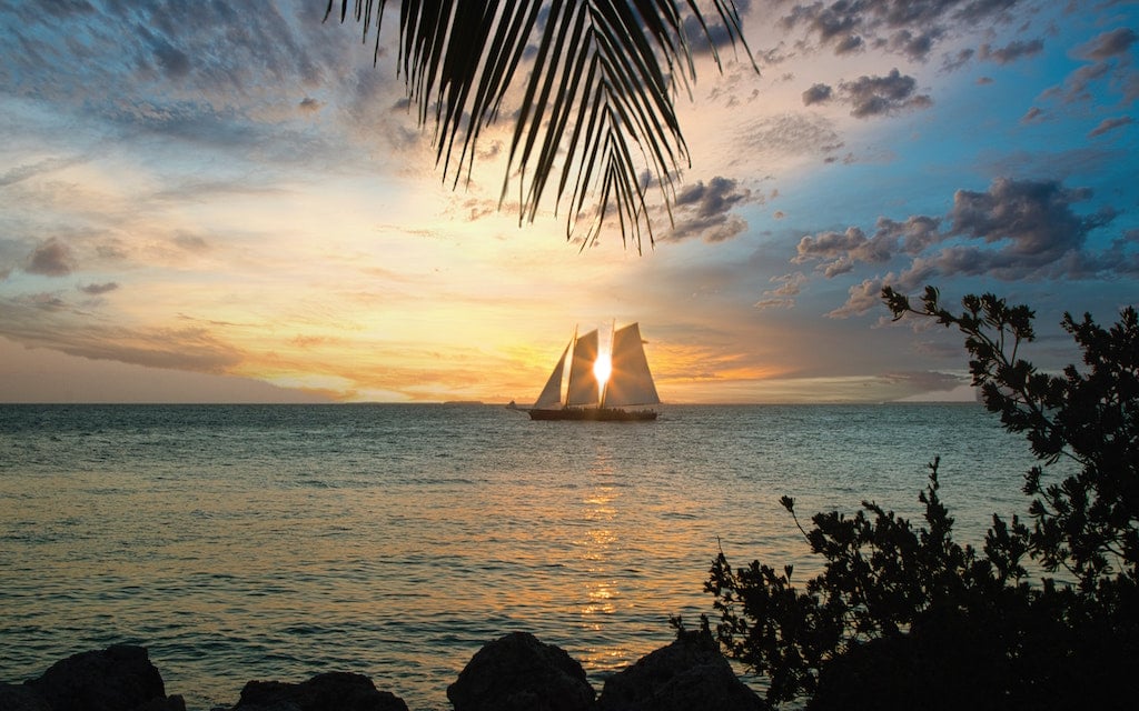 sailboat sailing in key west near fort zachary taylor state park, key west, florida keys